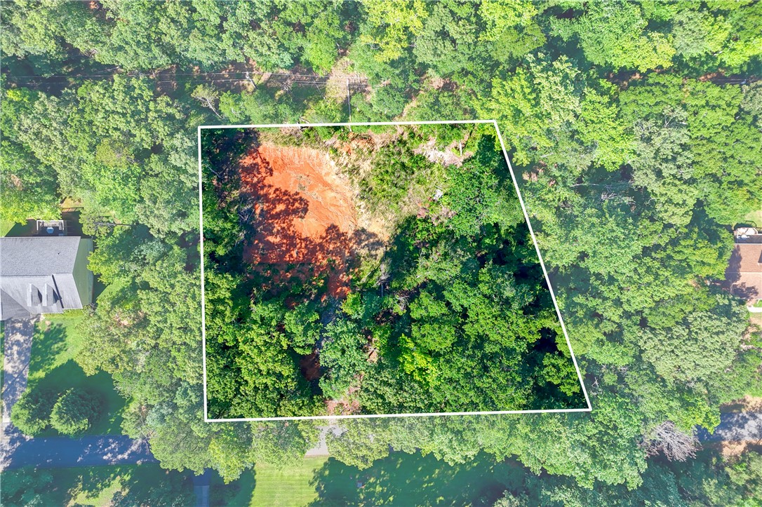 1020 Green Willow Trail Anderson, SC 29621 - Photo 23 of 28 Discover a tranquil, wooded lot offering a private, natural setting for your future home.