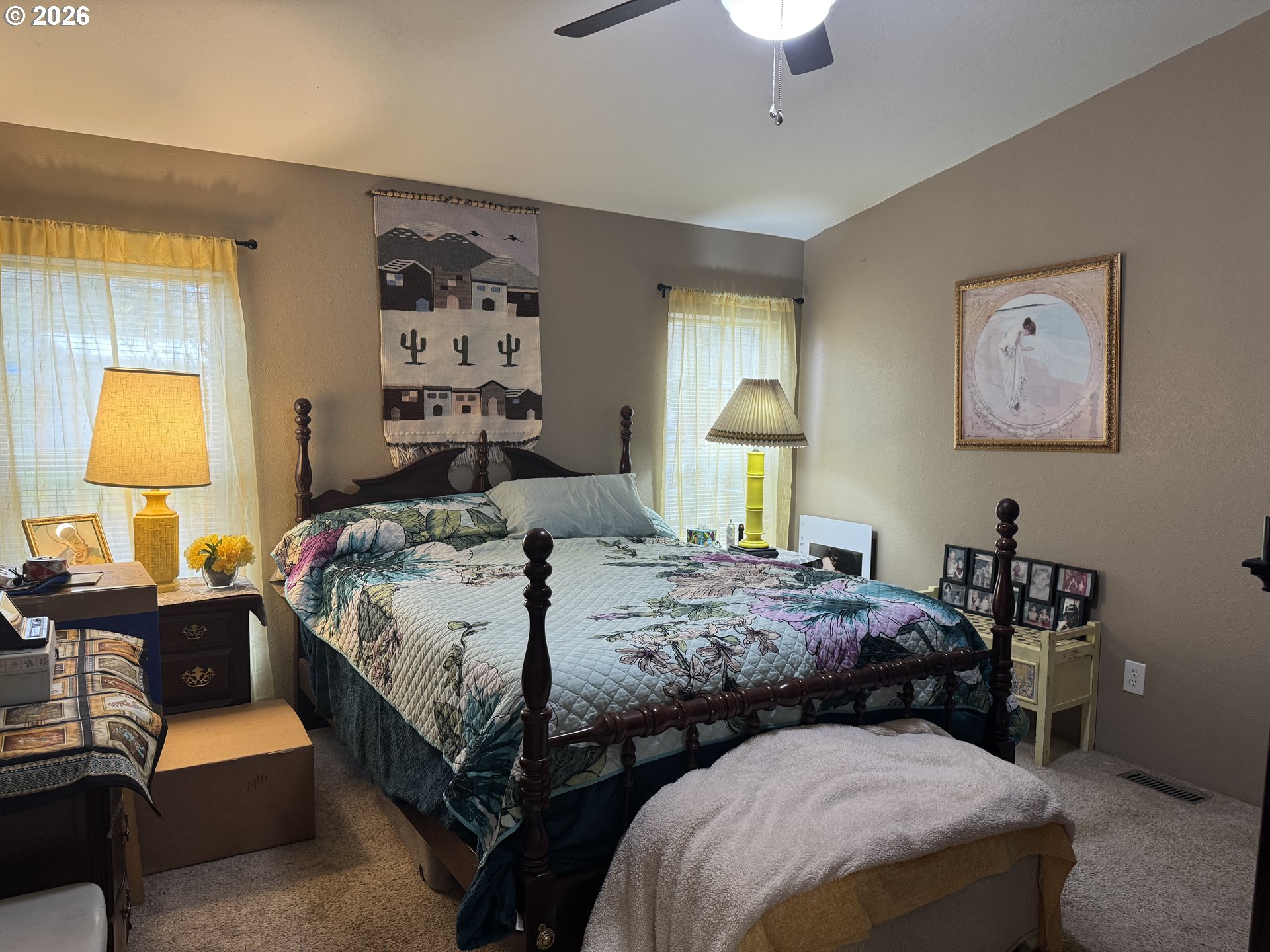 15619 Northeast Caples Road, Unit 44 Brush Prairie, WA 98606 - Photo 11 of 14 a bedroom with bed a lamp and a window