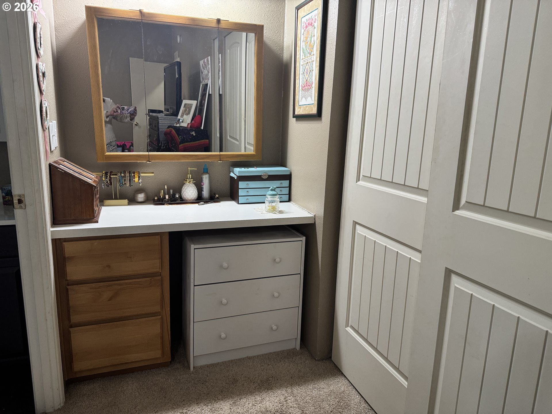 15619 Northeast Caples Road, Unit 44 Brush Prairie, WA 98606 - Photo 13 of 14 a bathroom with a sink and a mirror