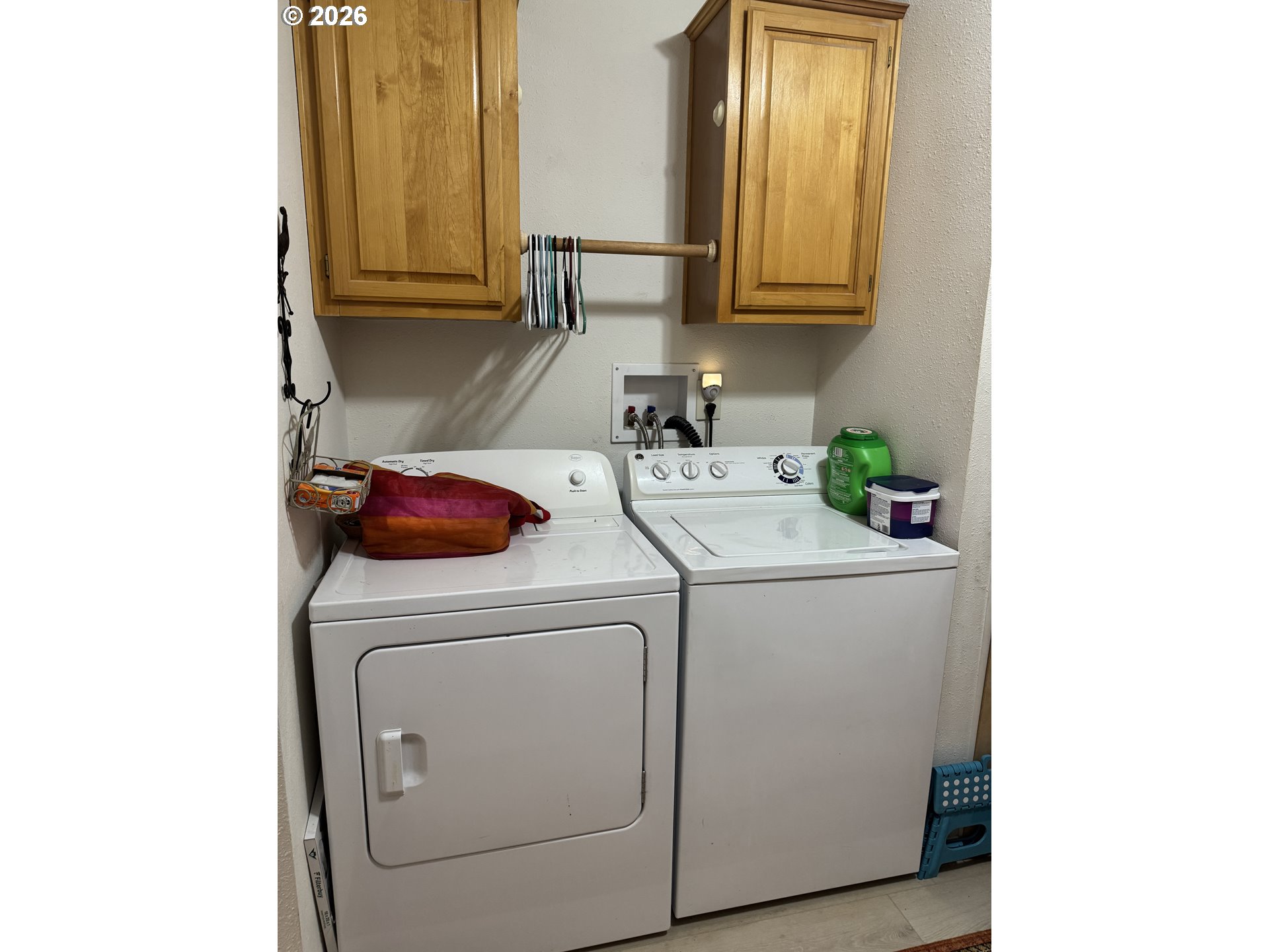 15619 Northeast Caples Road, Unit 44 Brush Prairie, WA 98606 - Photo 6 of 14 a utility room with dryer and washer
