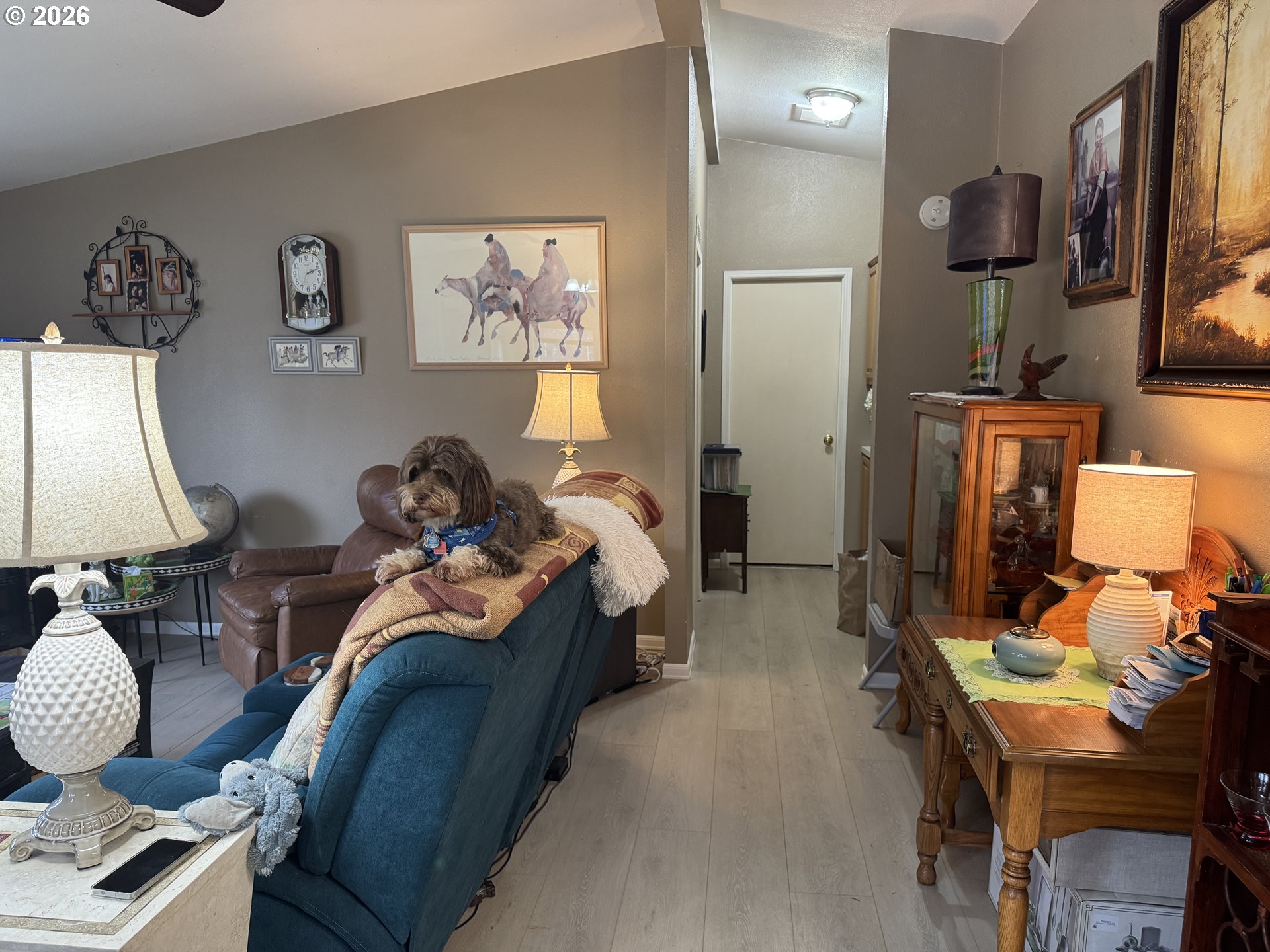 15619 Northeast Caples Road, Unit 44 Brush Prairie, WA 98606 - Photo 9 of 14 a bed room with a bed and a lamp