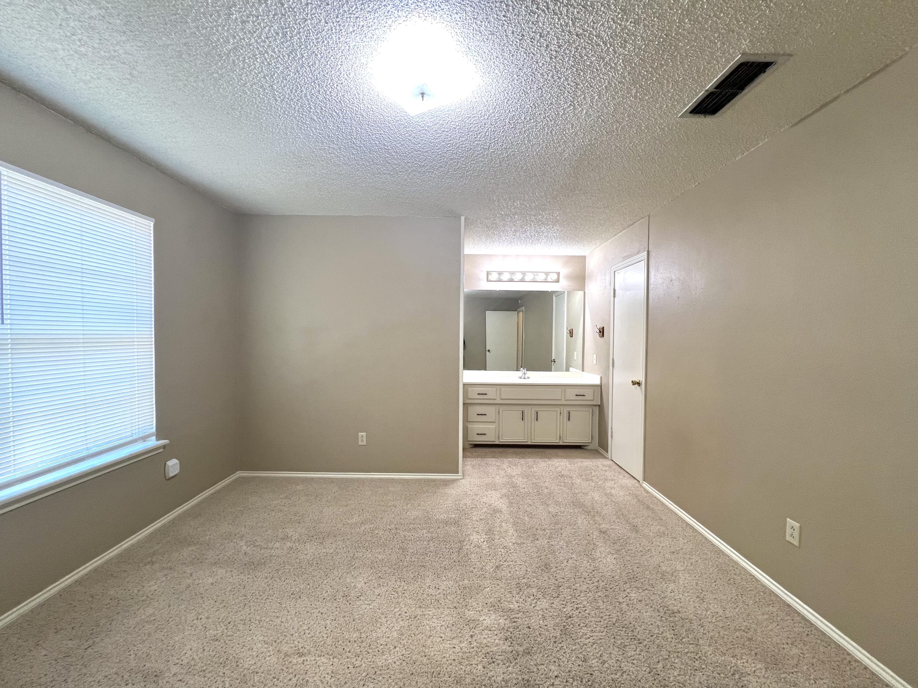5702 Brownfield Drive, Unit C Lubbock, TX 79414 - Photo 7 of 14 IMG_3735