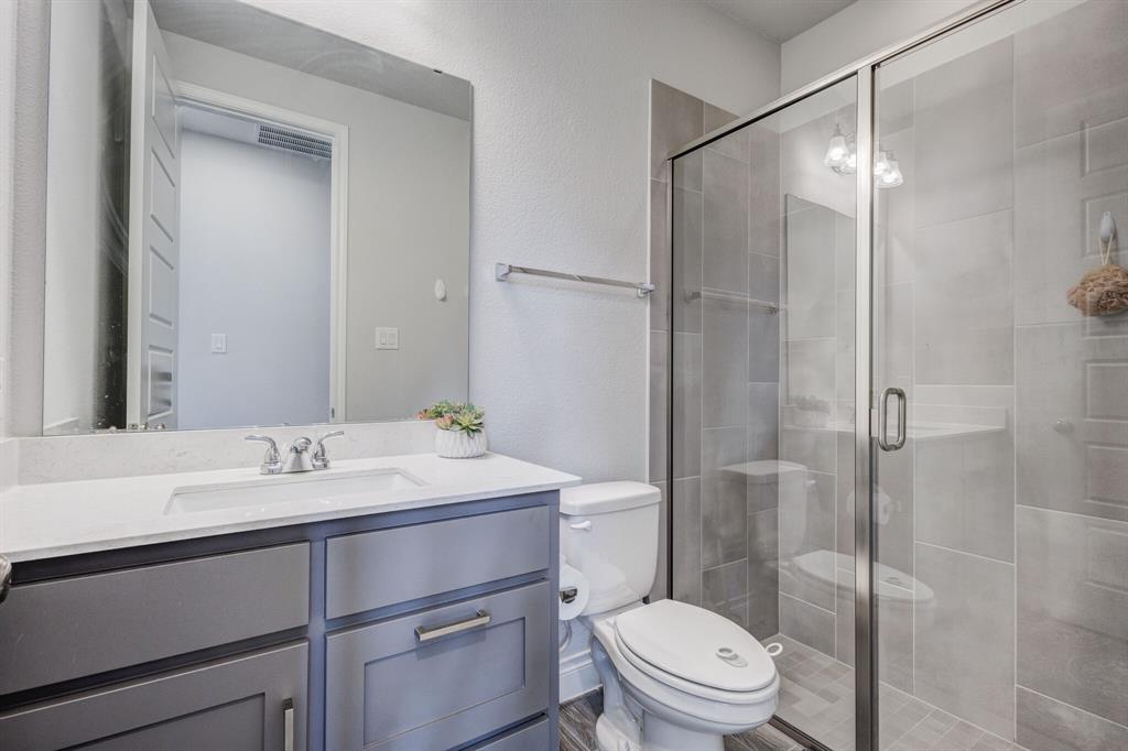 830 Knoxbridge Road Forney, TX 75126 - Photo 26 of 36 a bathroom with a sink toilet and shower