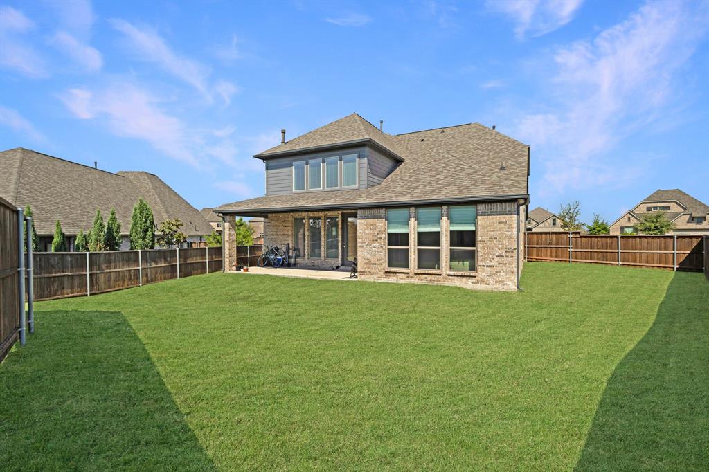 830 Knoxbridge Road Forney, TX 75126 - Photo 36 of 36 a front view of a house with a yard