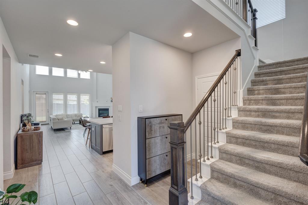 830 Knoxbridge Road Forney, TX 75126 - Photo 7 of 36 a view of entryway and hall with wooden floor
