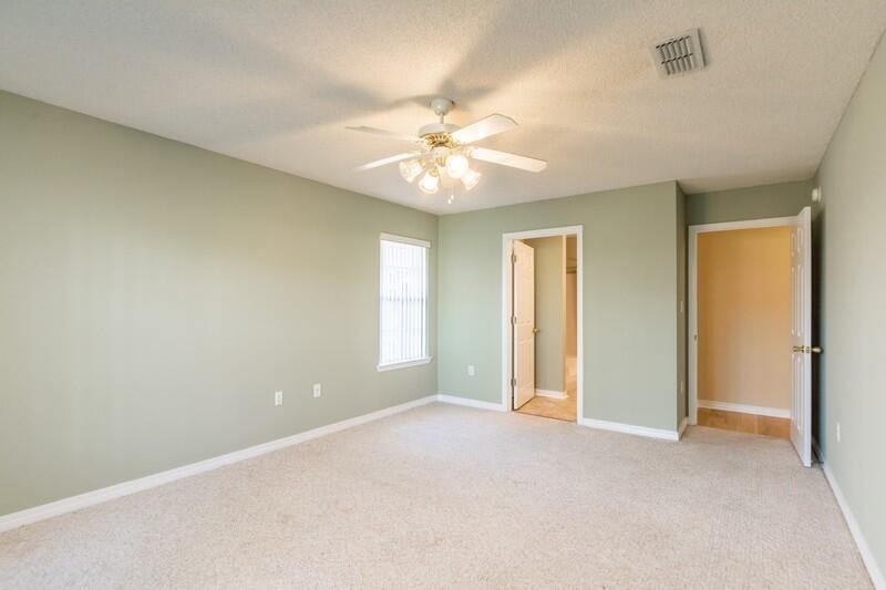 1607 Ella Ruth Drive Fort Walton Beach, FL 32547 - Photo 13 of 31 a view of an empty room with a window