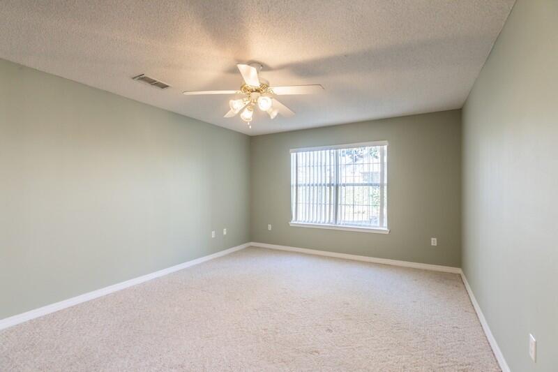 1607 Ella Ruth Drive Fort Walton Beach, FL 32547 - Photo 15 of 31 a view of an empty room with a window