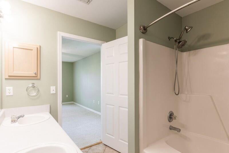 1607 Ella Ruth Drive Fort Walton Beach, FL 32547 - Photo 18 of 31 a bathroom with a tub shower vanity and a sink