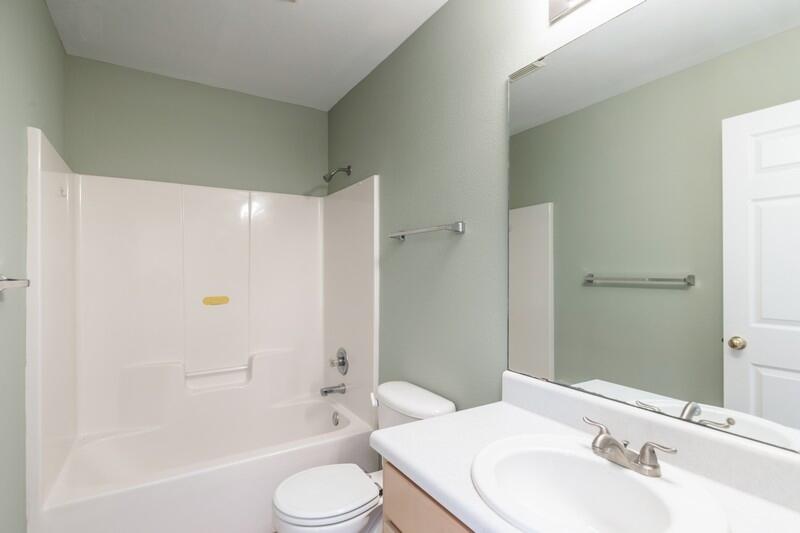 1607 Ella Ruth Drive Fort Walton Beach, FL 32547 - Photo 25 of 31 a bathroom with a sink toilet and shower