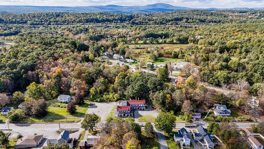an aerial view of a city with lots of residential buildings