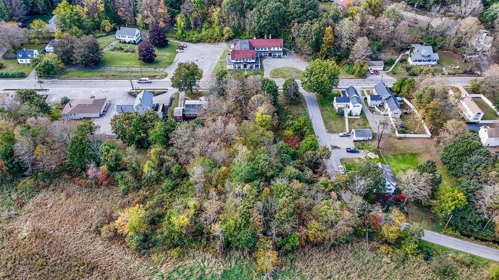 223 Worcester Road Sterling, MA 01564 - Photo 2 of 14 an aerial view of a house with a yard and lake view