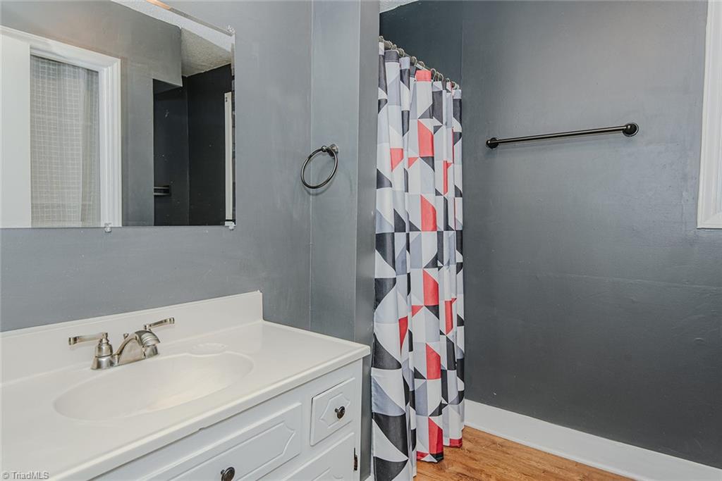 9409 Wheelers Church Road Cedar Grove, NC 27231 - Photo 21 of 49 main floor bathroom