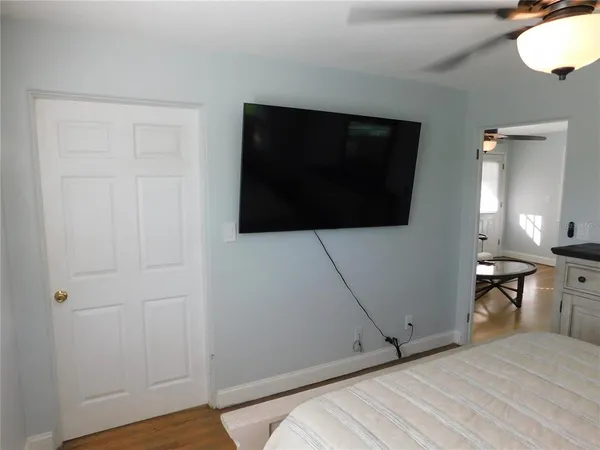 a view of a livingroom with wooden floor