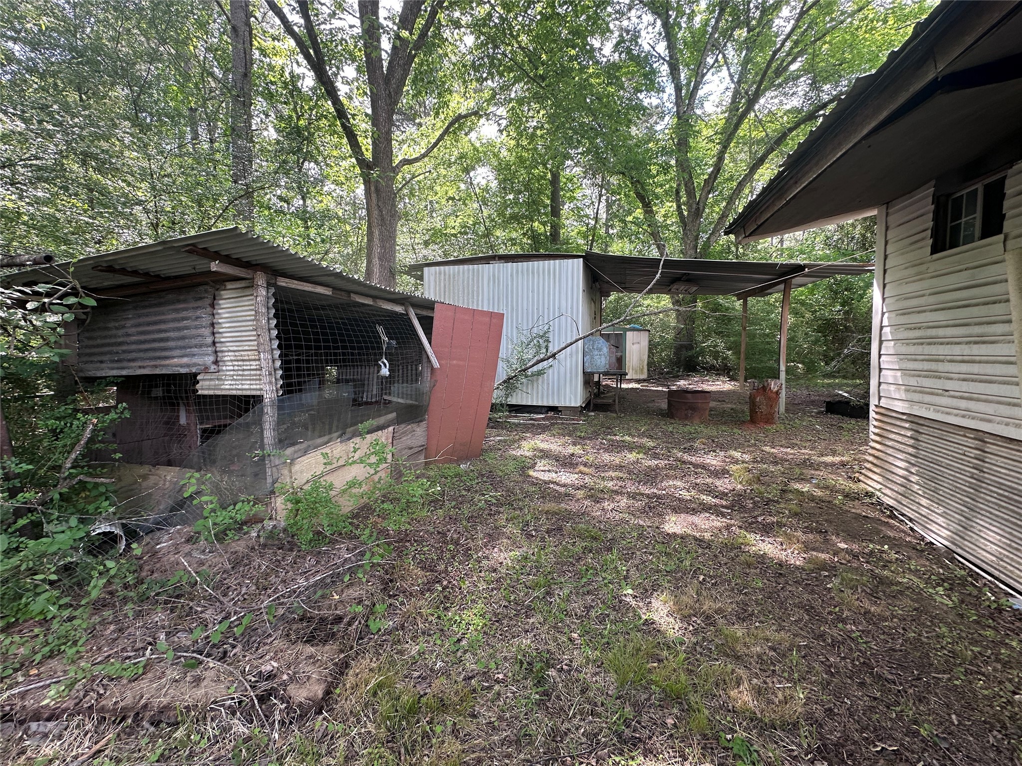 217 Box Factory Road Diboll, TX 75941 - Photo 12 of 14 a view of a house with a yard