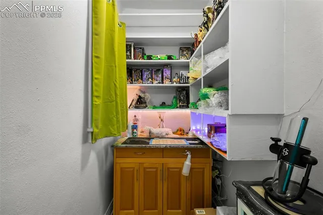 a room with storage and utility