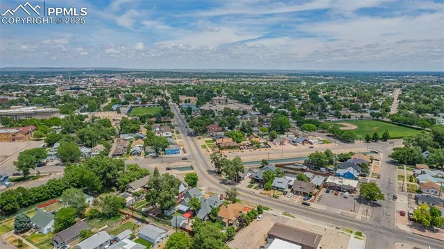 an aerial view of a city with lots of residential buildings