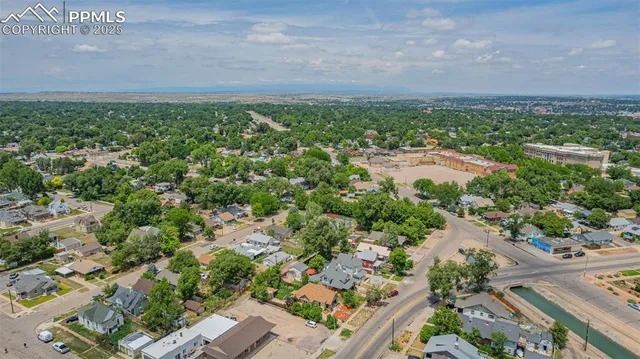 an aerial view of a city with lots of residential buildings