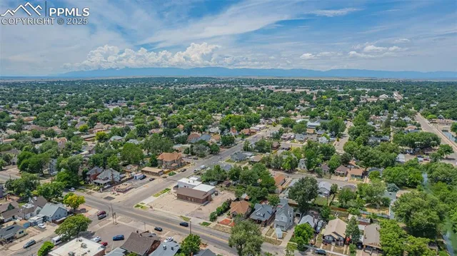 an aerial view of a city with lots of residential buildings