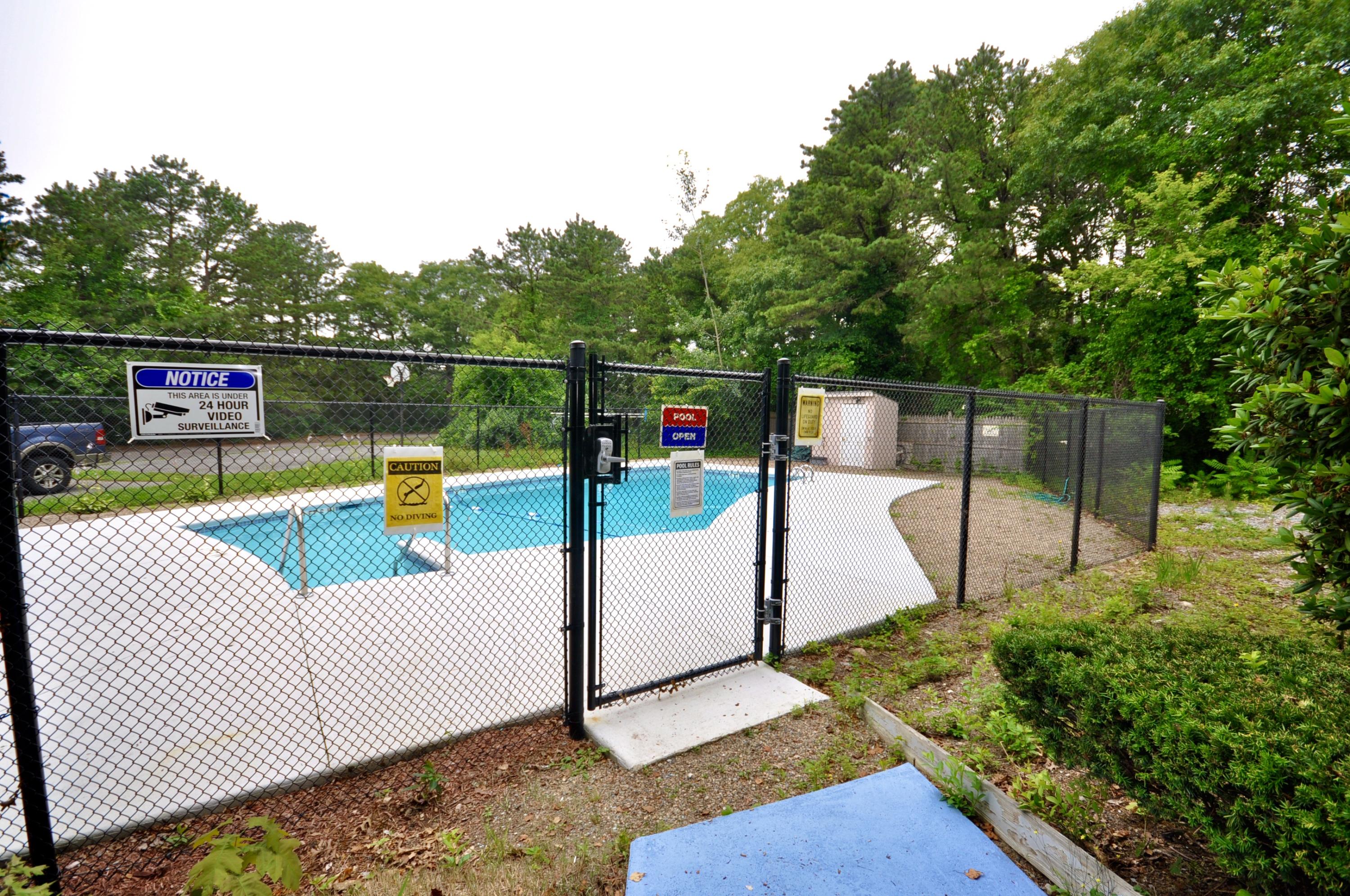401 Village Drive Bourne, MA 02532 - Photo 21 of 22 a view of a park with iron fence