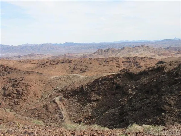 a view of mountains and valleys