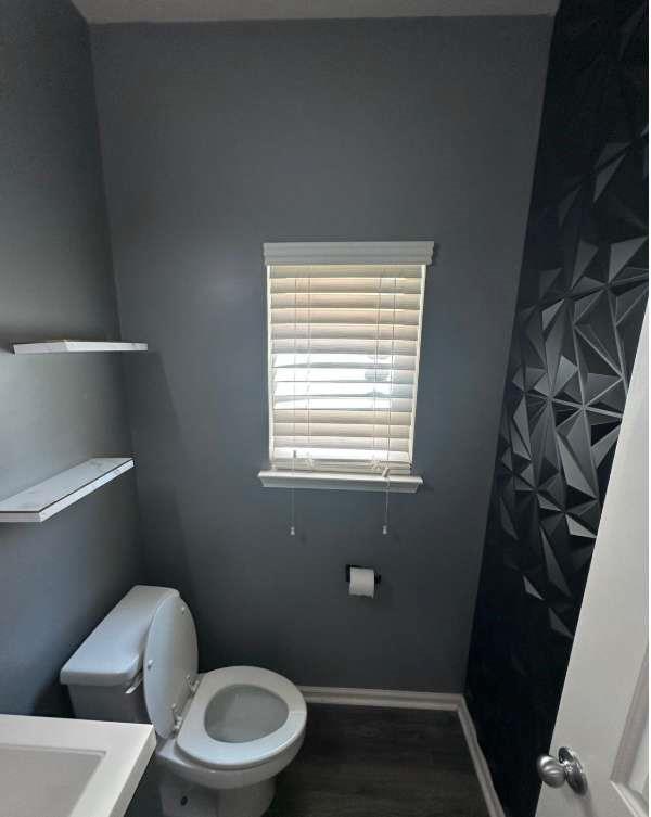 5103 Jack Drive Decatur, GA 30035 - Photo 8 of 34 a white toilet sitting next to a window