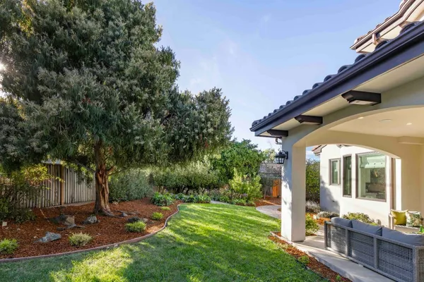 a view of backyard with green space