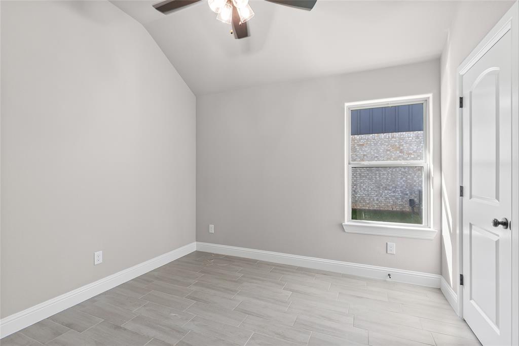 620 Jameson Springtown, TX 76082 - Photo 23 of 37 an empty room with a window