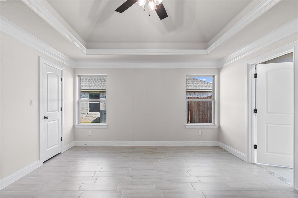 620 Jameson Springtown, TX 76082 - Photo 28 of 37 an empty room with windows and closet