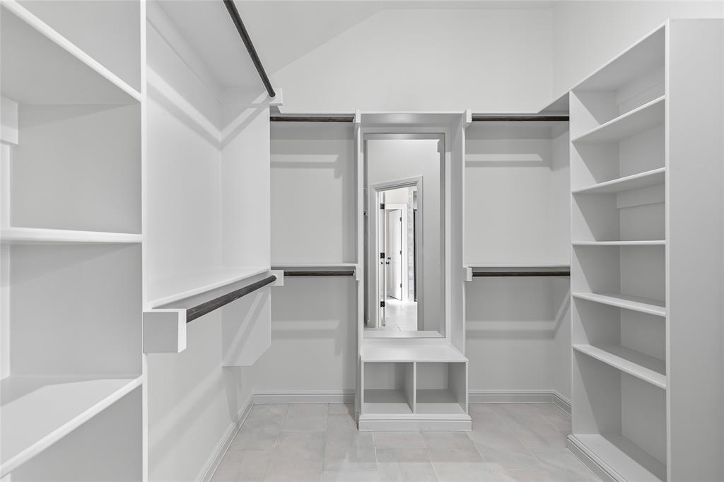 620 Jameson Springtown, TX 76082 - Photo 30 of 37 a view of walk in closet with empty racks