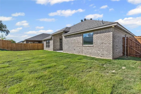 front view of a house with yard