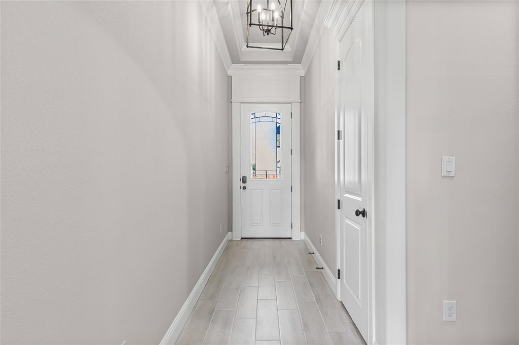 620 Jameson Springtown, TX 76082 - Photo 6 of 37 a view of a hallway with wooden floor