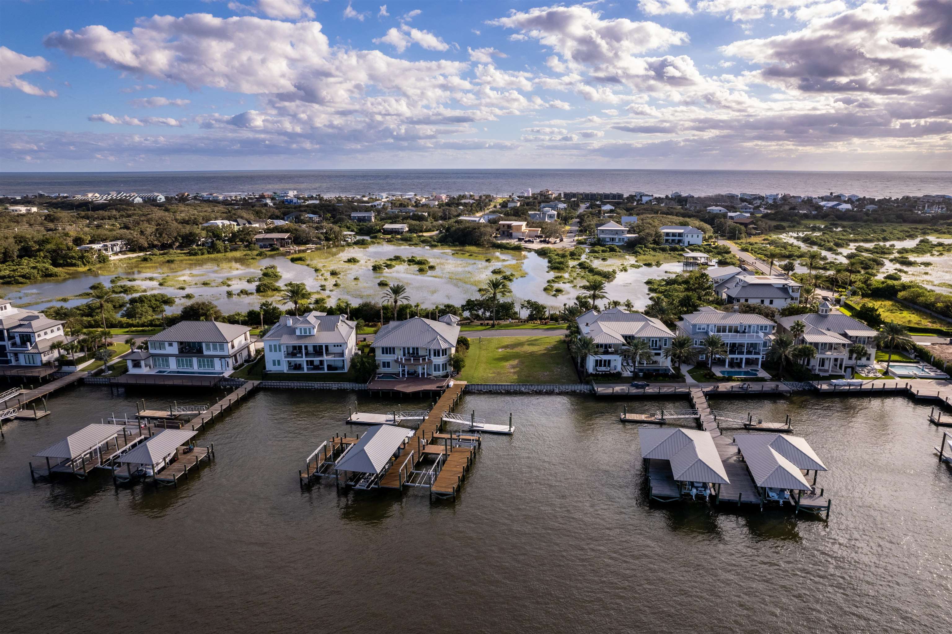 229 Rivershore Lane St. Augustine, FL 32084 - Photo 8 of 11 a view of a lake with cars parked