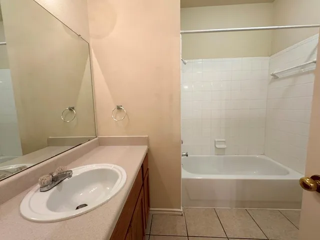 a bathroom with a sink and a bathtub