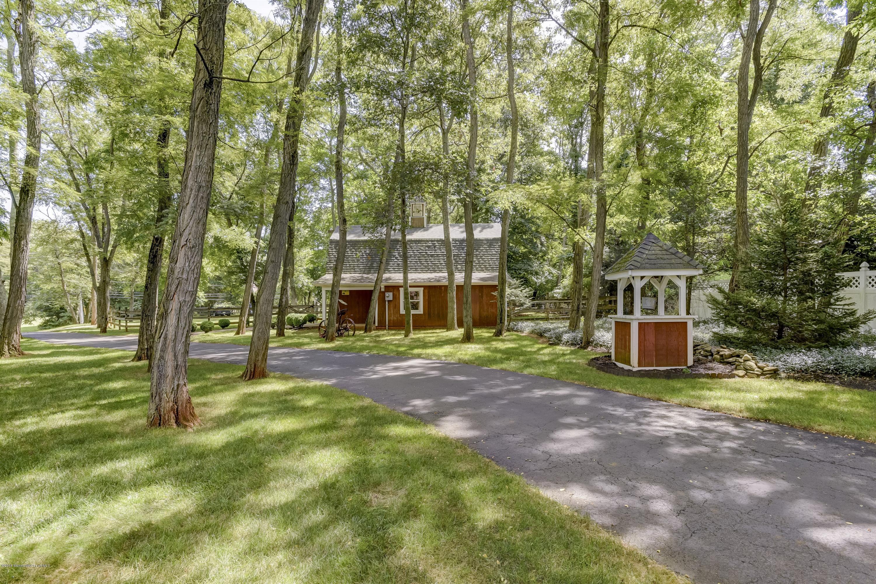 45 Heyers Mill Road Colts Neck, NJ 07722 - Photo 3 of 36 a view of a house with a yard