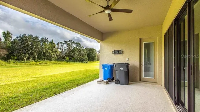 a front view of house with outdoor space and swimming pool