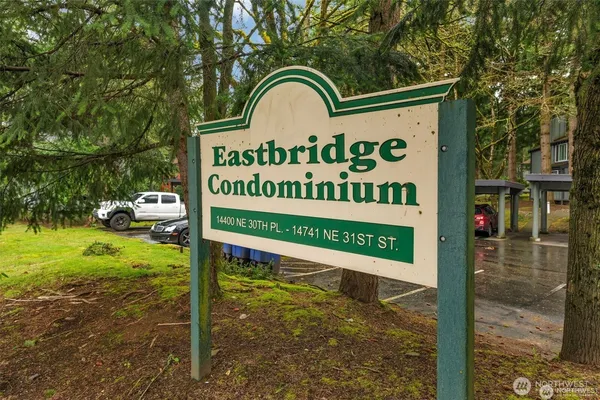 a sign on the side of the road