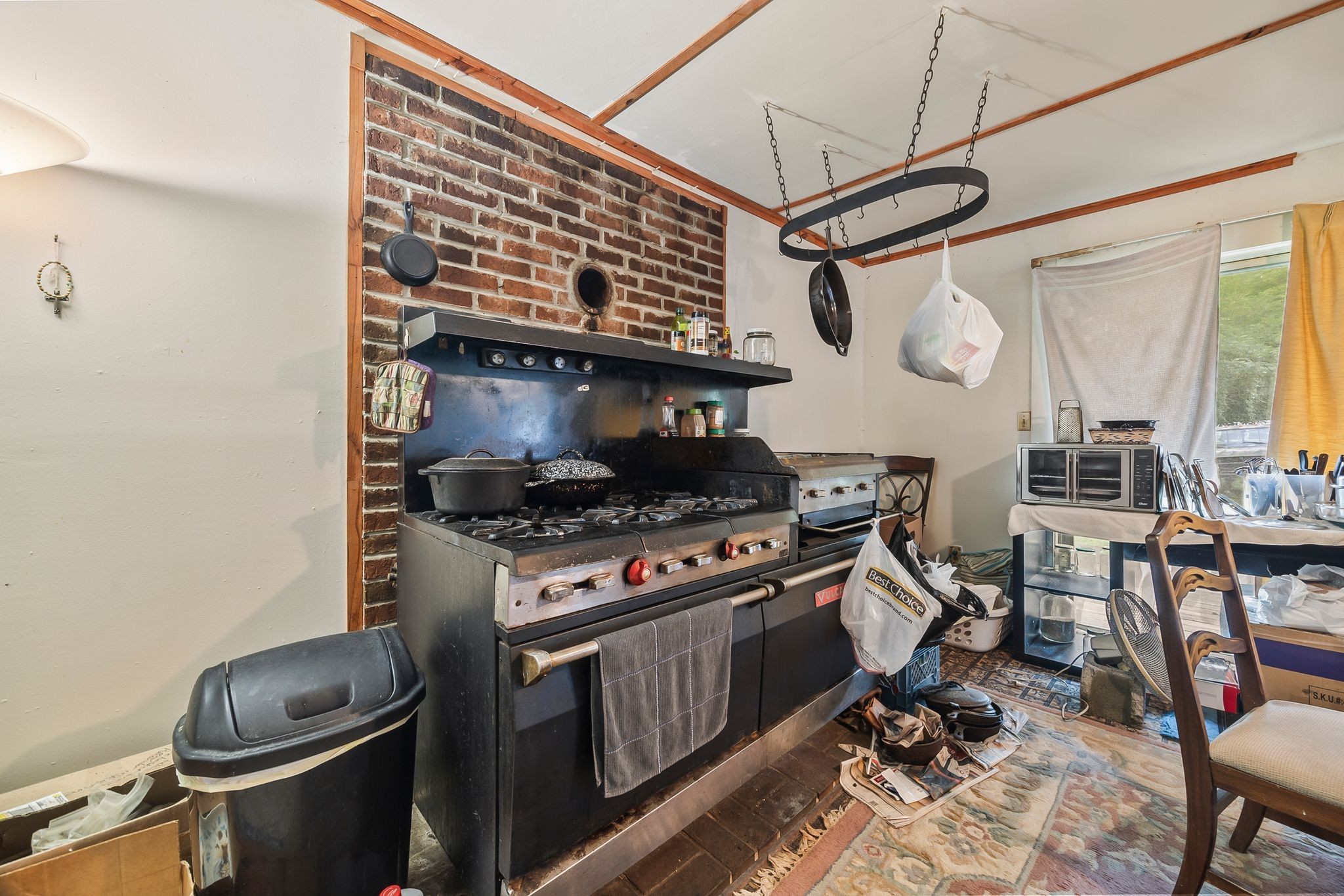1150 Bell Hollow Road Vanleer, TN 37181 - Photo 17 of 32 a stove top oven sitting inside of a kitchen
