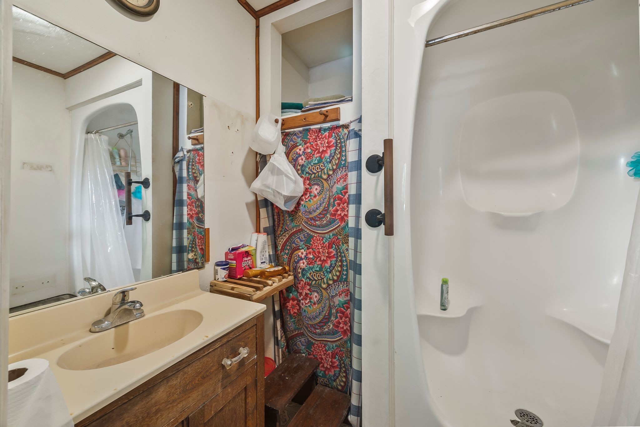 1150 Bell Hollow Road Vanleer, TN 37181 - Photo 23 of 32 a bathroom with a sink vanity and a mirror