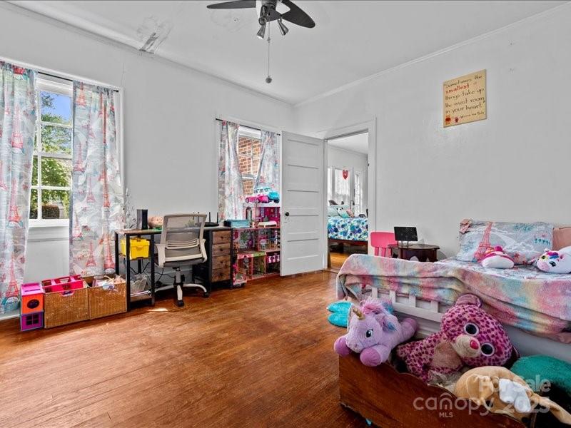 430 3rd Street Cheraw, SC 29520 - Photo 13 of 40 a bed room with furniture and a window