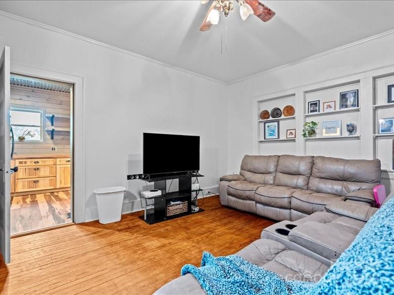 430 3rd Street Cheraw, SC 29520 - Photo 16 of 40 a living room with furniture and a flat screen tv