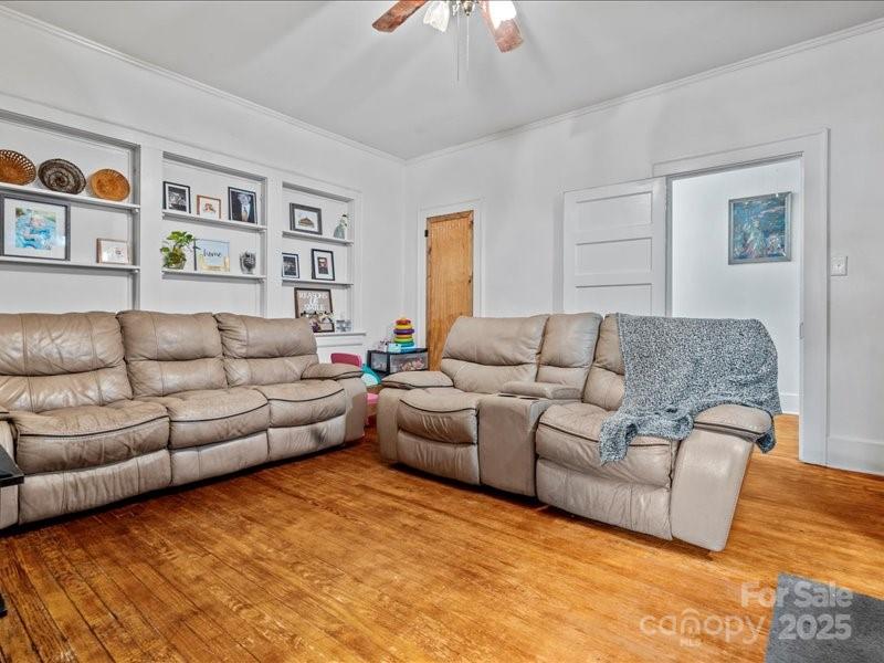 430 3rd Street Cheraw, SC 29520 - Photo 18 of 40 a living room with furniture and painting on the wall