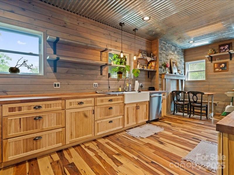 430 3rd Street Cheraw, SC 29520 - Photo 19 of 40 a kitchen with stainless steel appliances granite countertop a sink and cabinets
