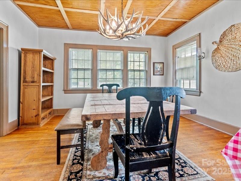 430 3rd Street Cheraw, SC 29520 - Photo 20 of 40 a view of a dining room with furniture and wooden floor