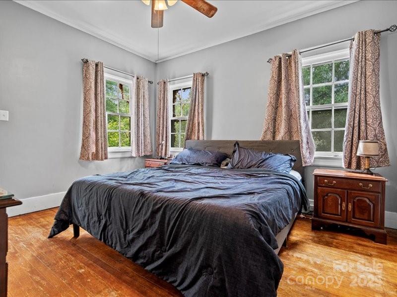 430 3rd Street Cheraw, SC 29520 - Photo 27 of 40 a bedroom with a bed and a large window