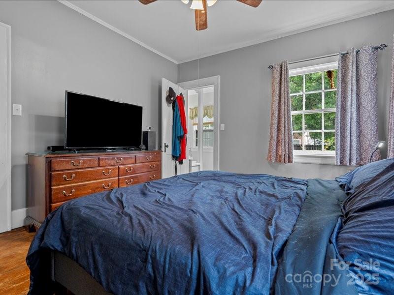 430 3rd Street Cheraw, SC 29520 - Photo 28 of 40 a bed room with a bed a television and a window