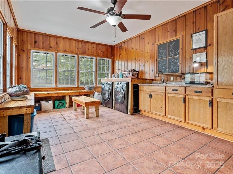 430 3rd Street Cheraw, SC 29520 - Photo 32 of 40 a open kitchen with stainless steel appliances granite countertop a stove top oven a sink dishwasher and white cabinets with wooden floor