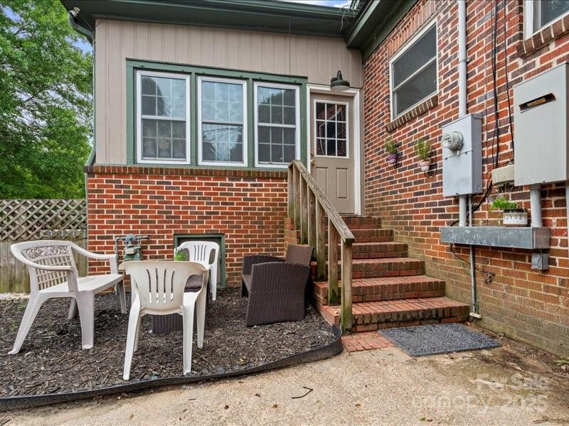 430 3rd Street Cheraw, SC 29520 - Photo 33 of 40 a front view of a house with a chairs and table