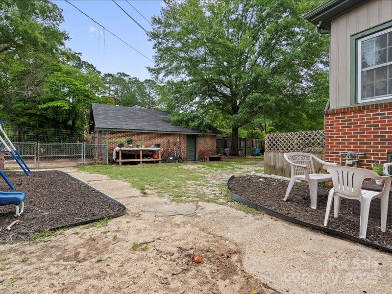 430 3rd Street Cheraw, SC 29520 - Photo 34 of 40 a view of a house with a yard and furniture