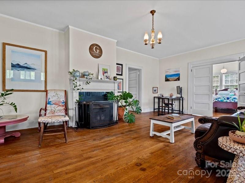 430 3rd Street Cheraw, SC 29520 - Photo 6 of 40 a living room with furniture and a chandelier