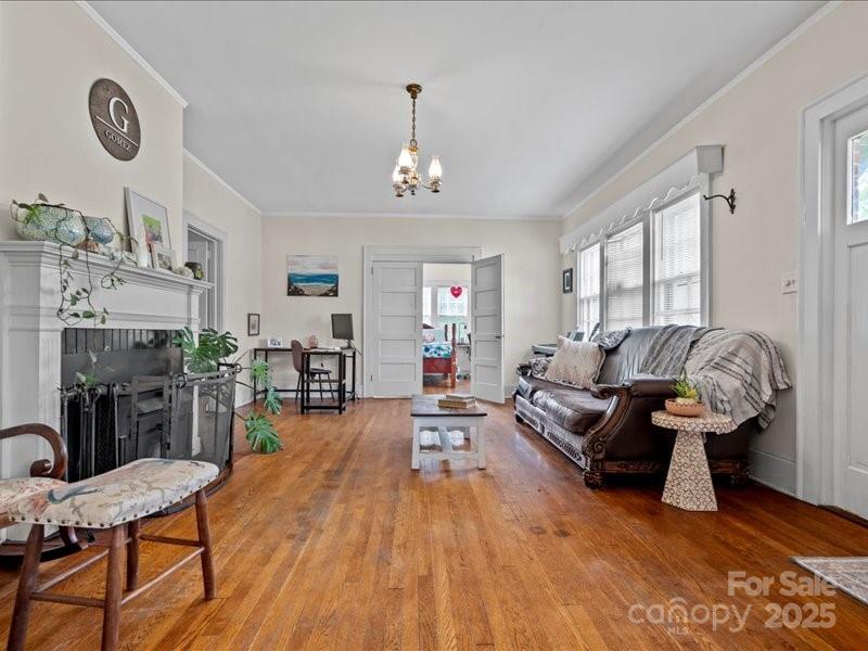 430 3rd Street Cheraw, SC 29520 - Photo 7 of 40 a living room with furniture and wooden floor